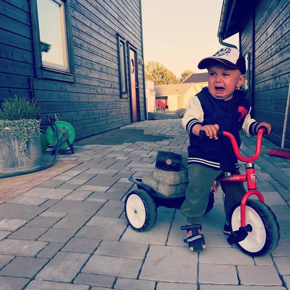 Little man working as paving stone dealer
