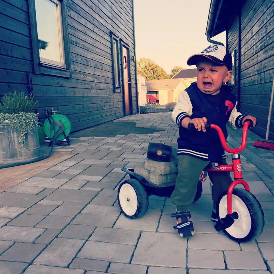 Little man working as paving stone dealer