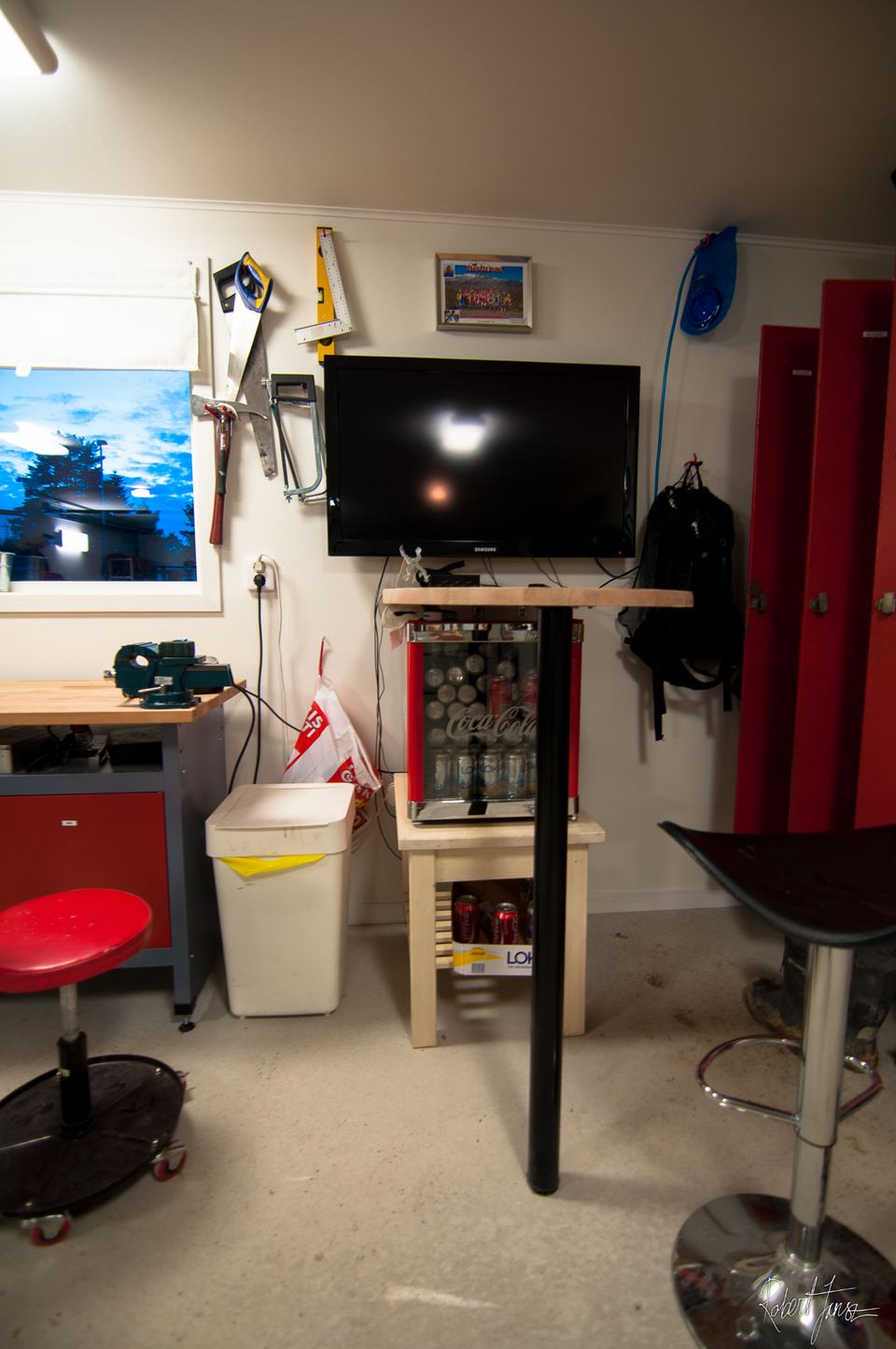 Garage bar with fridge filled with beverage