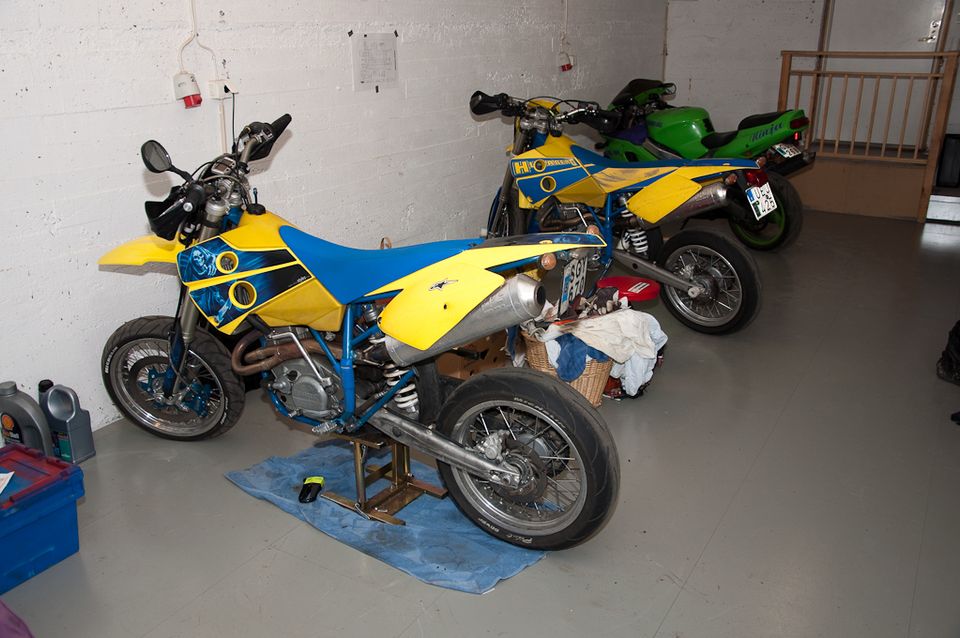 The husaberg 650 parked in the garage